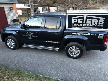 Peters Tak & Montage servicebil – VW Amarok pick-up med Trebolit-partnerlogotyp